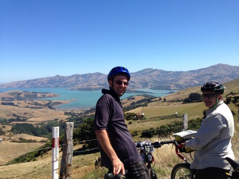 Chris looking down on Akaroa Harbor from Summit road. All downhill from here. 