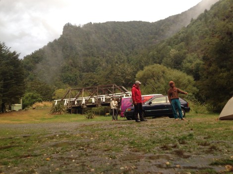 The two guys in the back opened their camper and all the water which accumulated on the roof went into the van - soaked everything - luckily they were able to laugh about it. Jay in the foreground talking to "the dude" . 